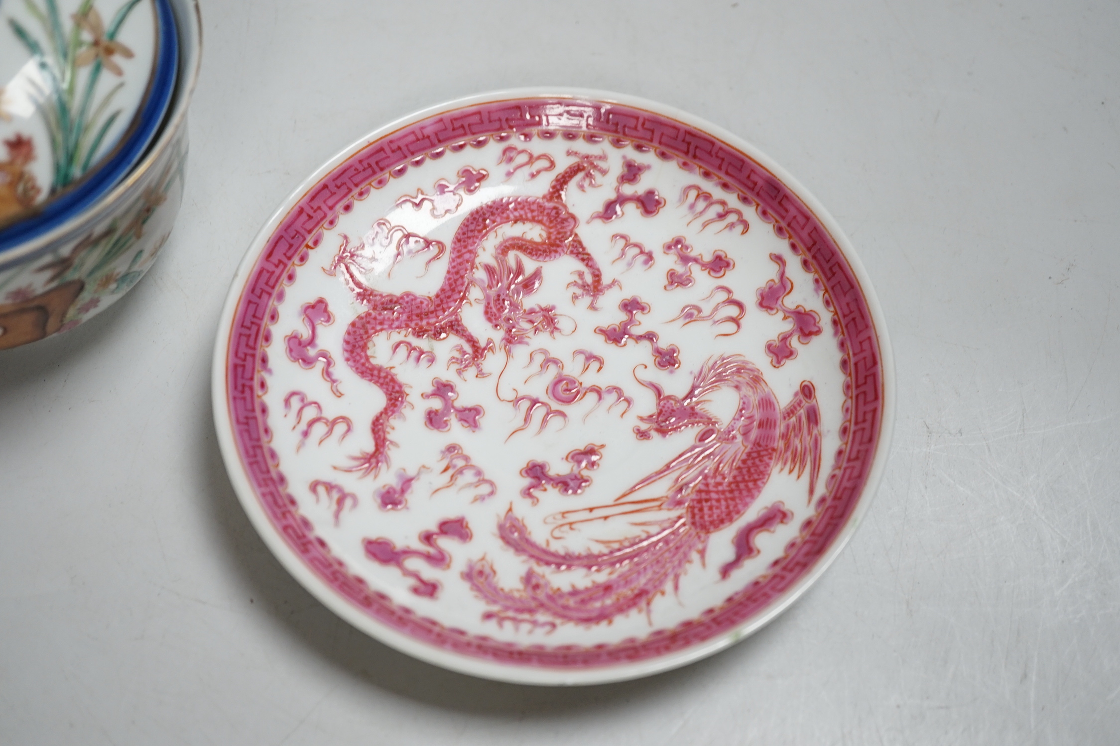 A Chinese famille rose rice bowl and cover and a pink enamel ‘dragon dish’, dish 14cm diameter